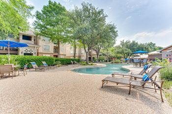Pool With Relaxing Chairs at The Brazos, Dallas, TX, 75287